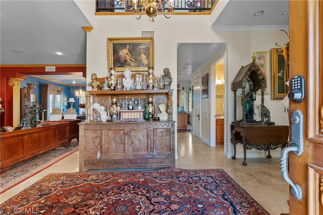 a view of living room with furniture and a rug