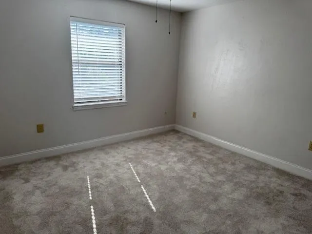 an empty room with a window