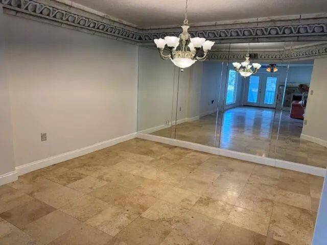 a view of a room with a chandelier