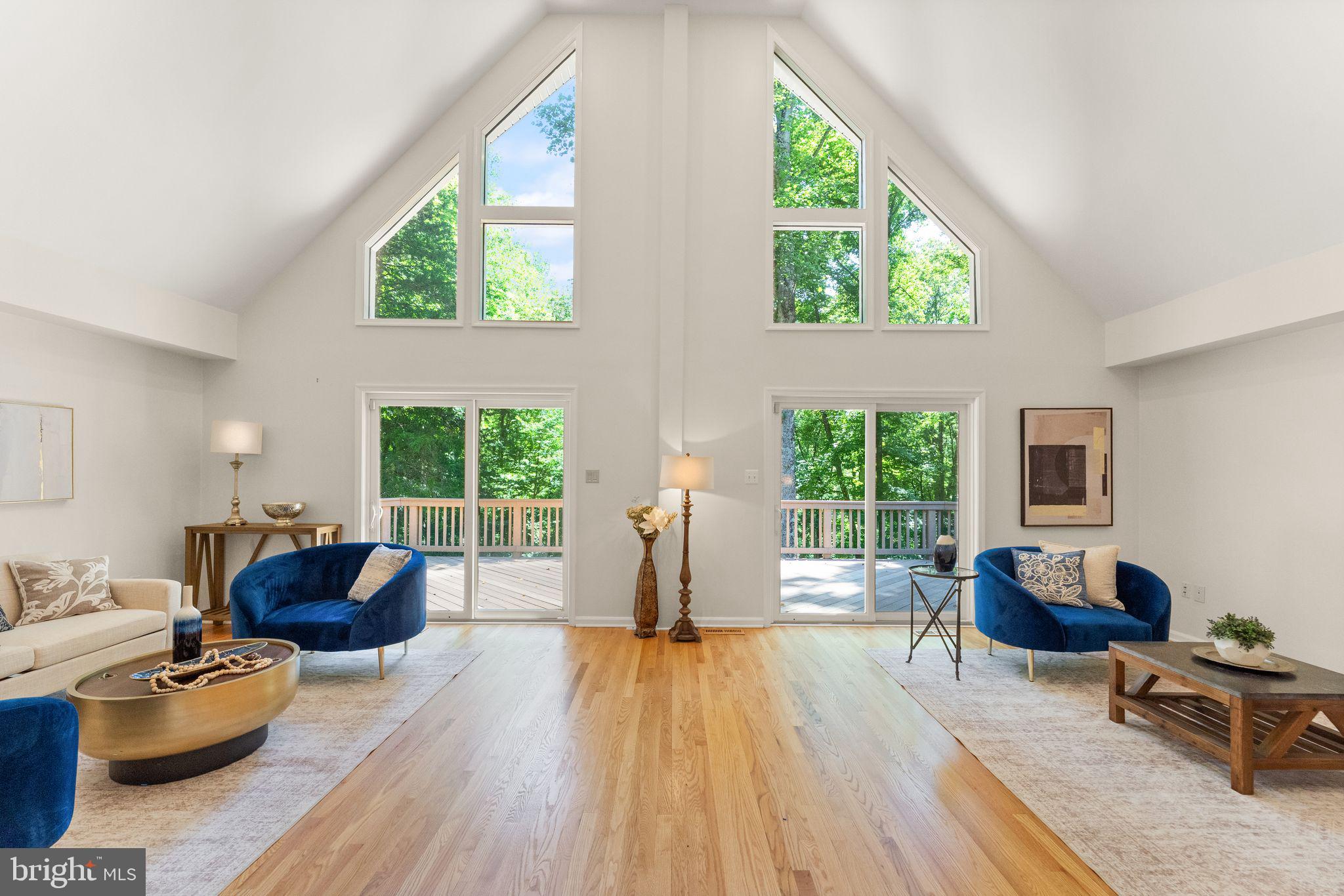 38620 Lime Kiln Road Leesburg, VA 20175 - Photo 21 of 87 a living room with furniture and a large window