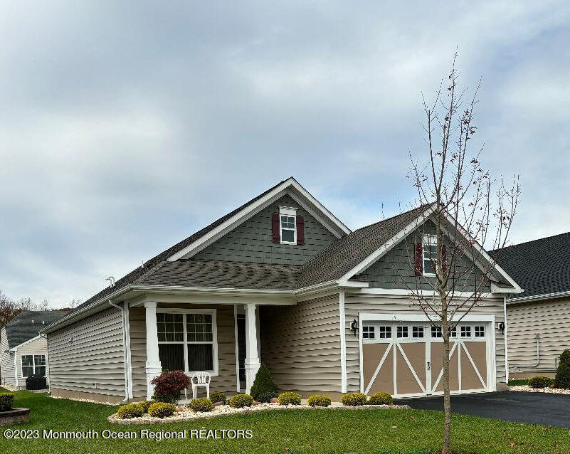 12 Harvest Ridge Road Howell, NJ 07731 - Photo 1 of 27 a house view with a garden space