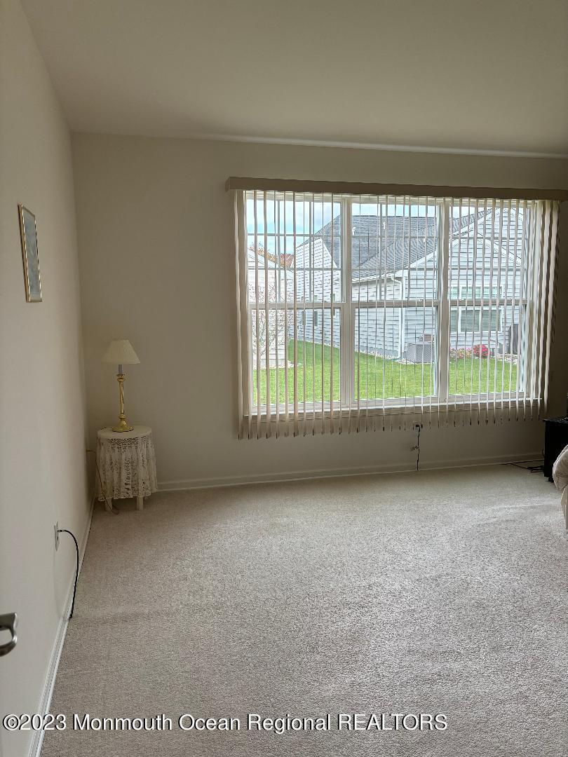 12 Harvest Ridge Road Howell, NJ 07731 - Photo 16 of 27 a view of an empty room with a window