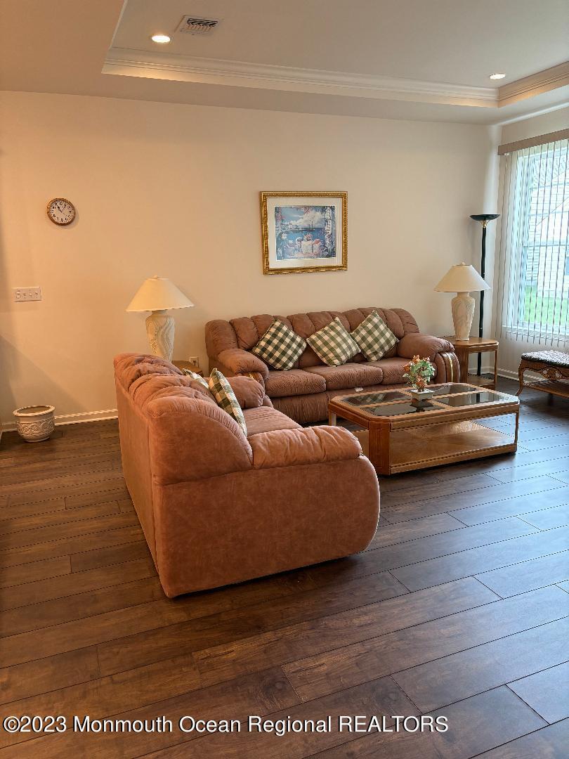 12 Harvest Ridge Road Howell, NJ 07731 - Photo 17 of 27 a living room with furniture and window