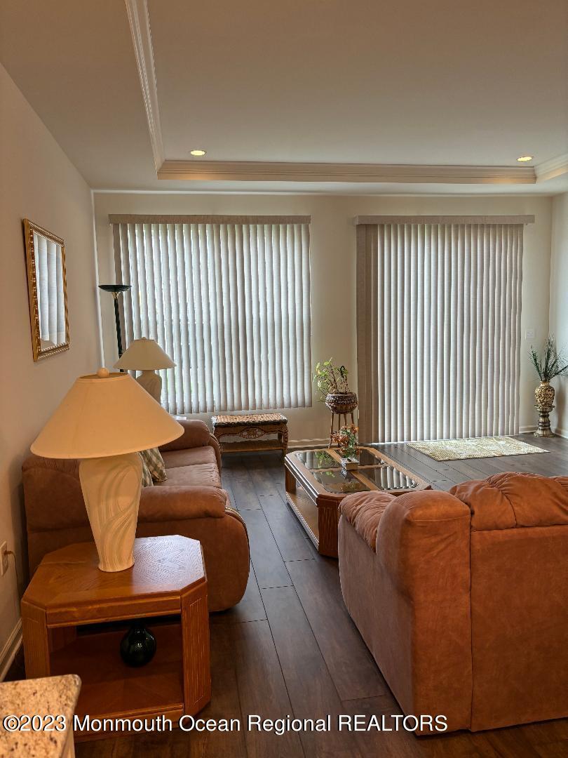 12 Harvest Ridge Road Howell, NJ 07731 - Photo 18 of 27 a living room with furniture and a window