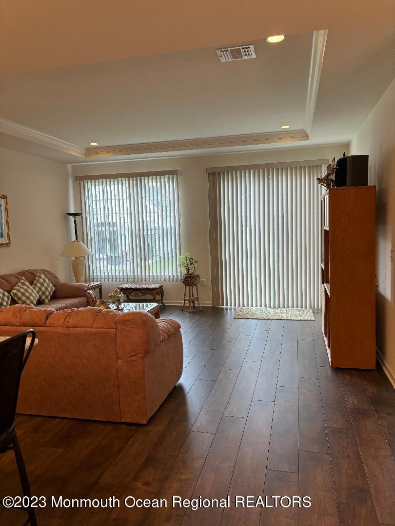 12 Harvest Ridge Road Howell, NJ 07731 - Photo 19 of 27 a bed sitting in a spacious bedroom next to a window