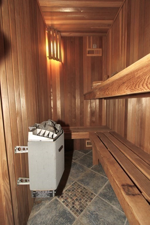 4 Carl Street Worcester, MA 01607 - Photo 12 of 27 a kitchen with a stove and a refrigerator