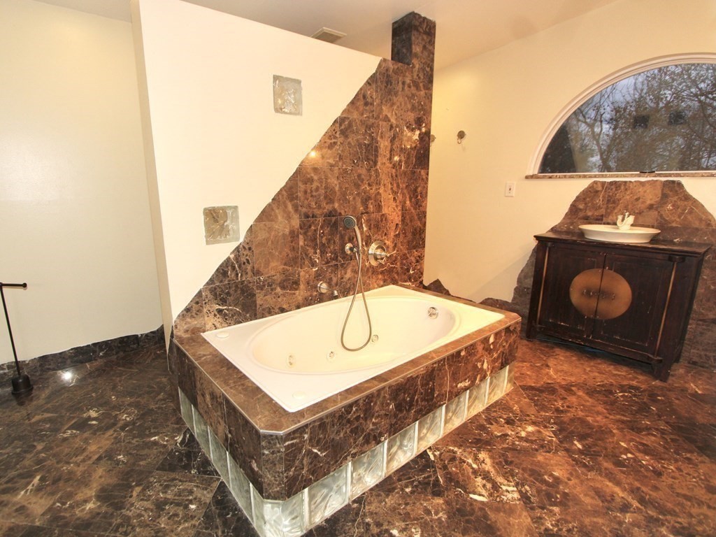 4 Carl Street Worcester, MA 01607 - Photo 18 of 27 a view of a fireplace in a hallway