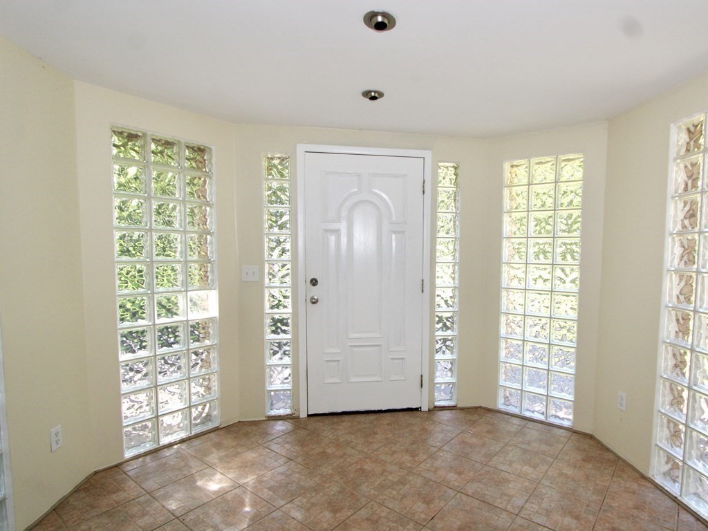 4 Carl Street Worcester, MA 01607 - Photo 2 of 27 a view of an empty room with a window