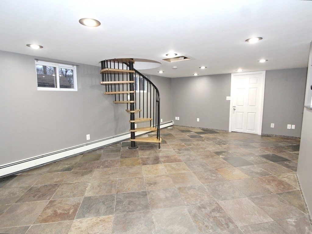 4 Carl Street Worcester, MA 01607 - Photo 22 of 27 a view of an empty room with a window