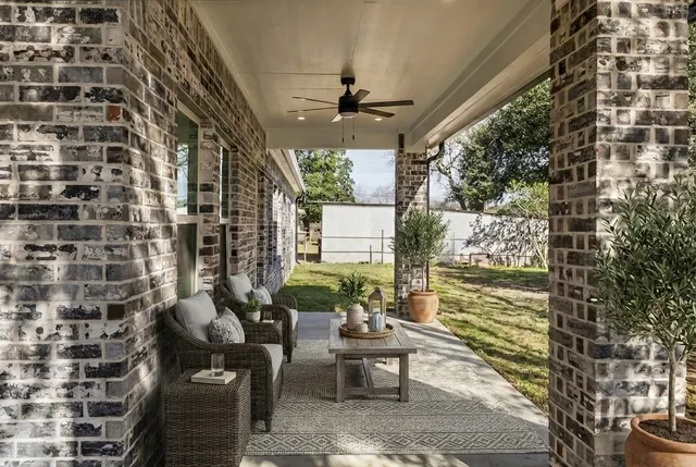 a building outdoor space with patio furniture