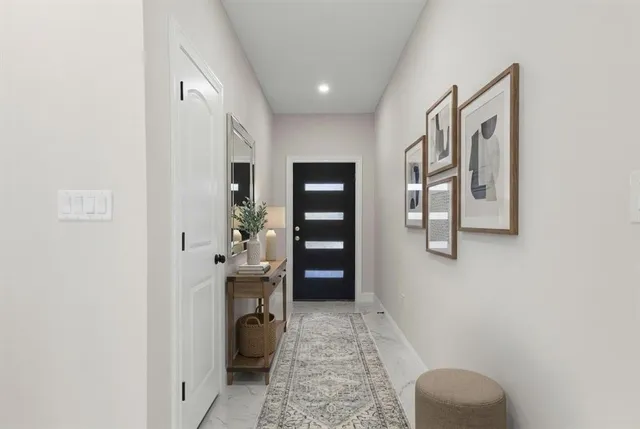 a bathroom with a tub and shower