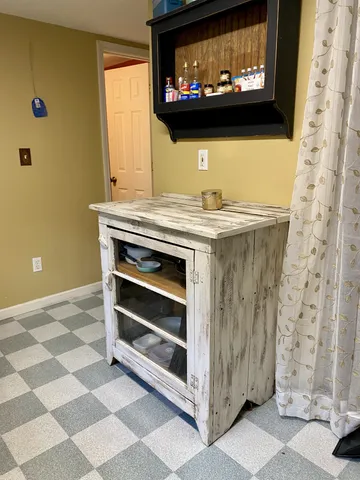 a view of a fireplace with a flat screen tv