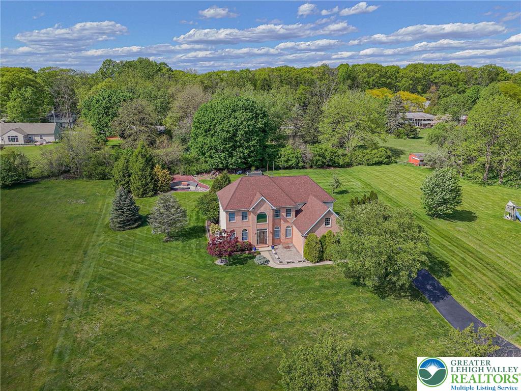 6551 Overlook Road Orefield, PA 18069 - Photo 3 of 82 an aerial view of a house with a yard