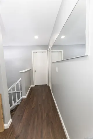 a view of entryway with wooden floor