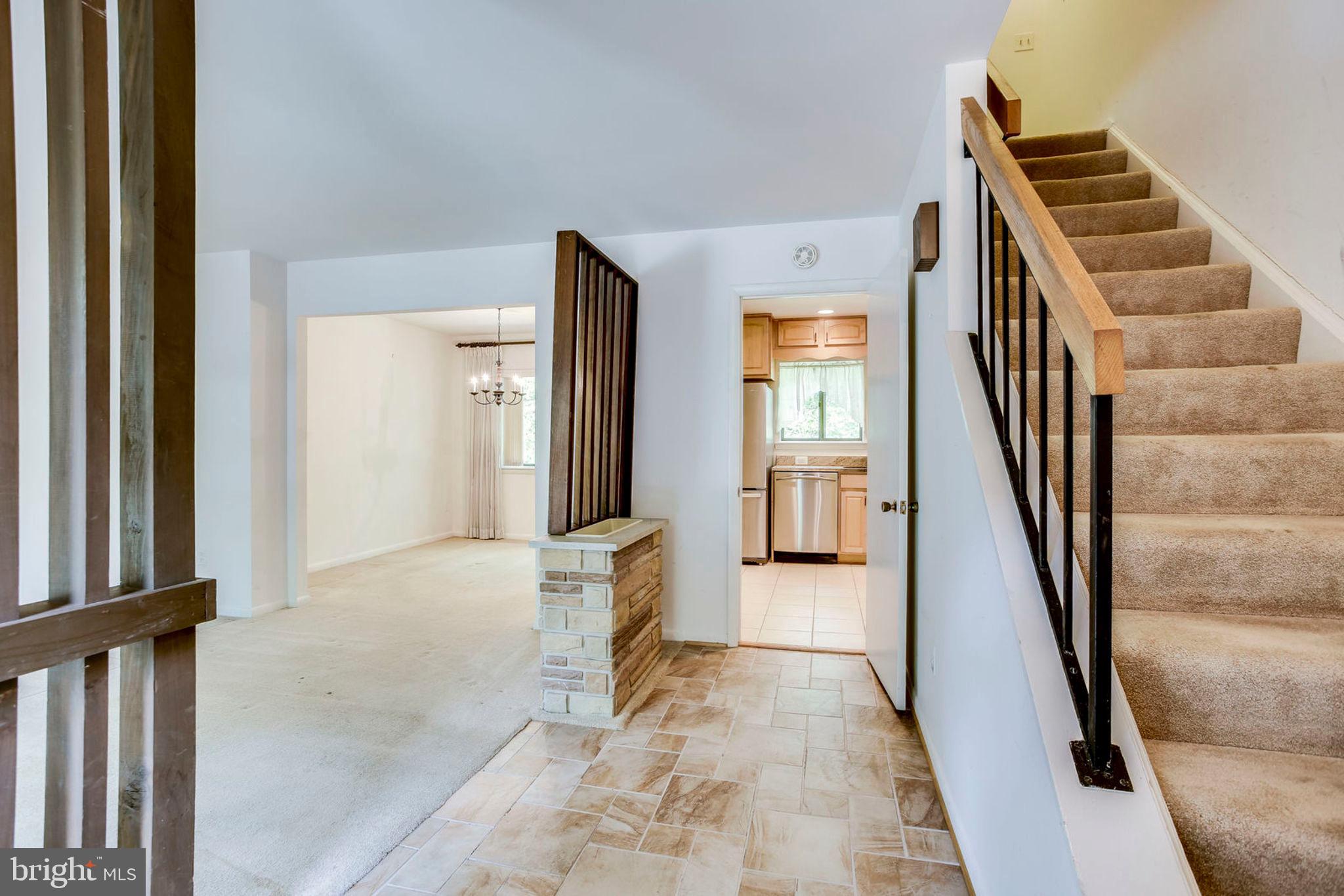 11904 Barrel Cooper Court Reston, VA 20191 - Photo 3 of 47 Tile and stone touches in foyer