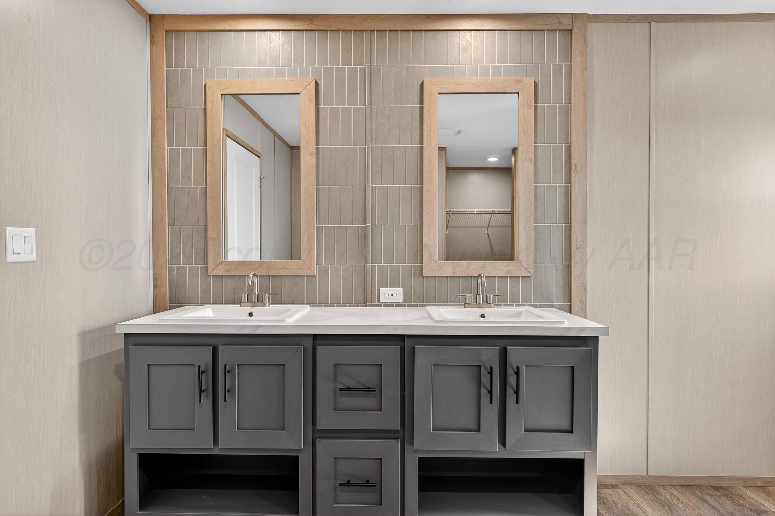 2680 Avery Rd Canyon Canyon, TX 79015 - Photo 15 of 37 a bathroom with a sink and a mirror