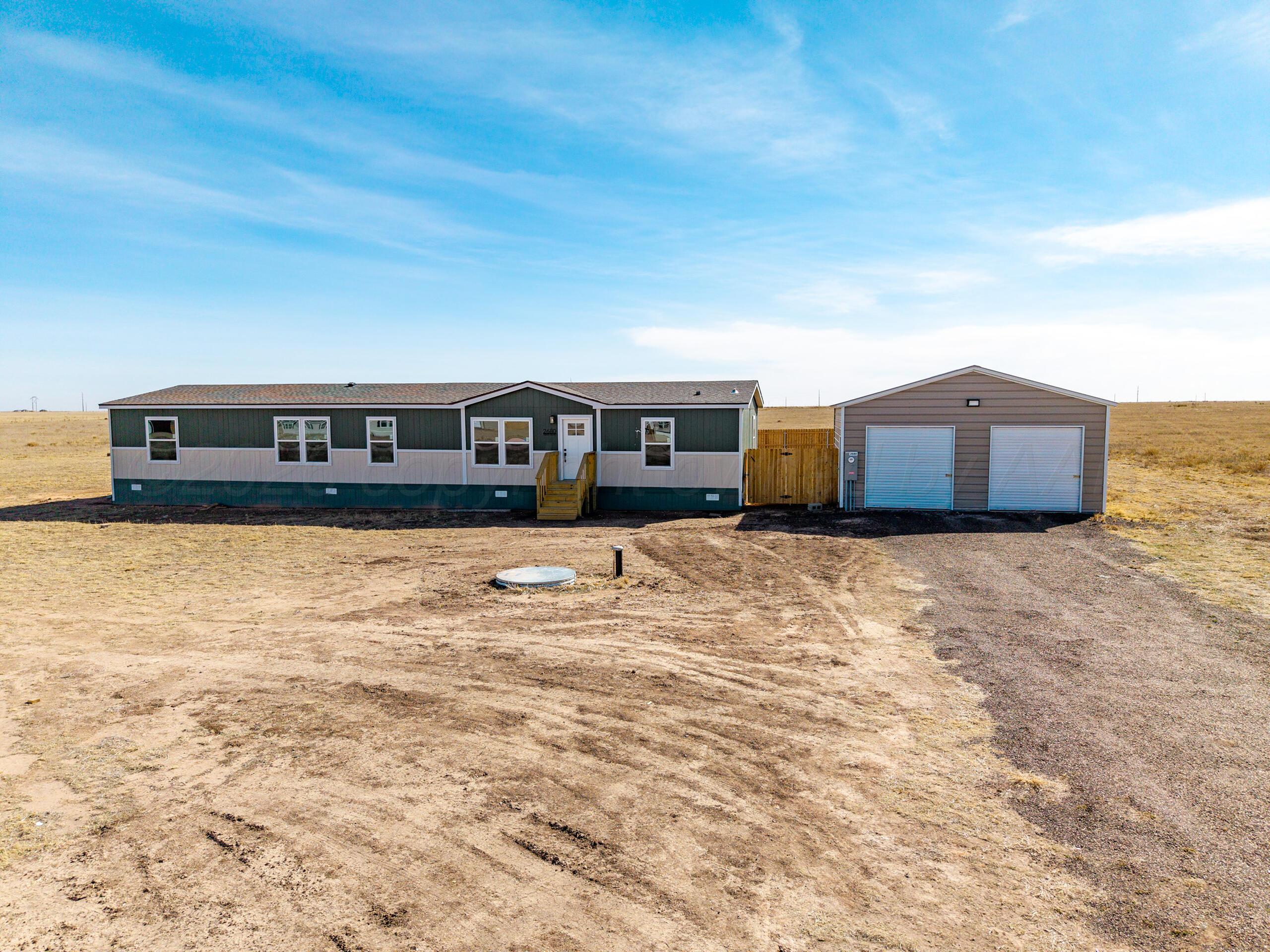 2680 Avery Rd Canyon Canyon, TX 79015 - Photo 2 of 35 a living room with a couch