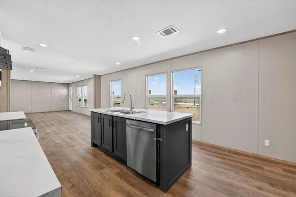 a view of kitchen island wooden cabinets