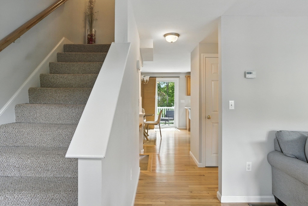 2 Sandpiper Way, Unit A Salisbury, MA 01952 - Photo 13 of 30 a view of entryway and hall with wooden floor