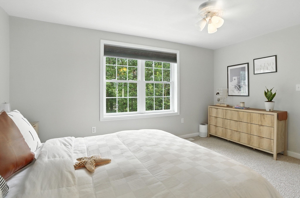 2 Sandpiper Way, Unit A Salisbury, MA 01952 - Photo 15 of 30 a bedroom with a bed and a dresser