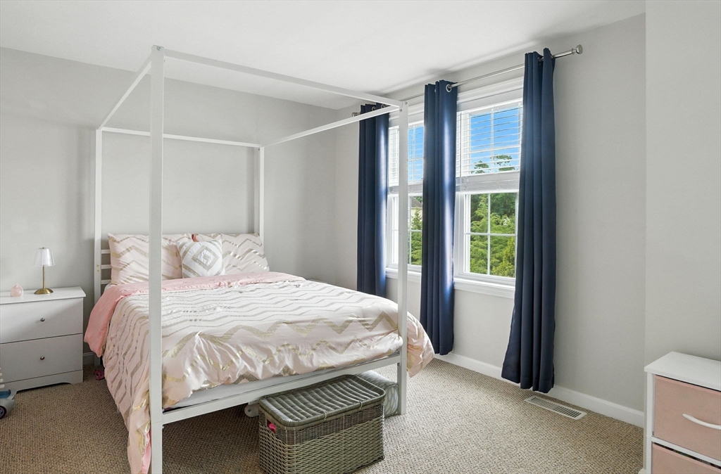 2 Sandpiper Way, Unit A Salisbury, MA 01952 - Photo 17 of 30 a bedroom with a bed and a window