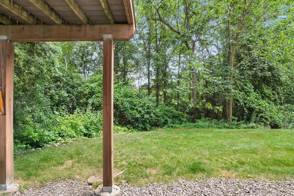 2 Sandpiper Way, Unit A Salisbury, MA 01952 - Photo 21 of 30 a view of a backyard with a large tree