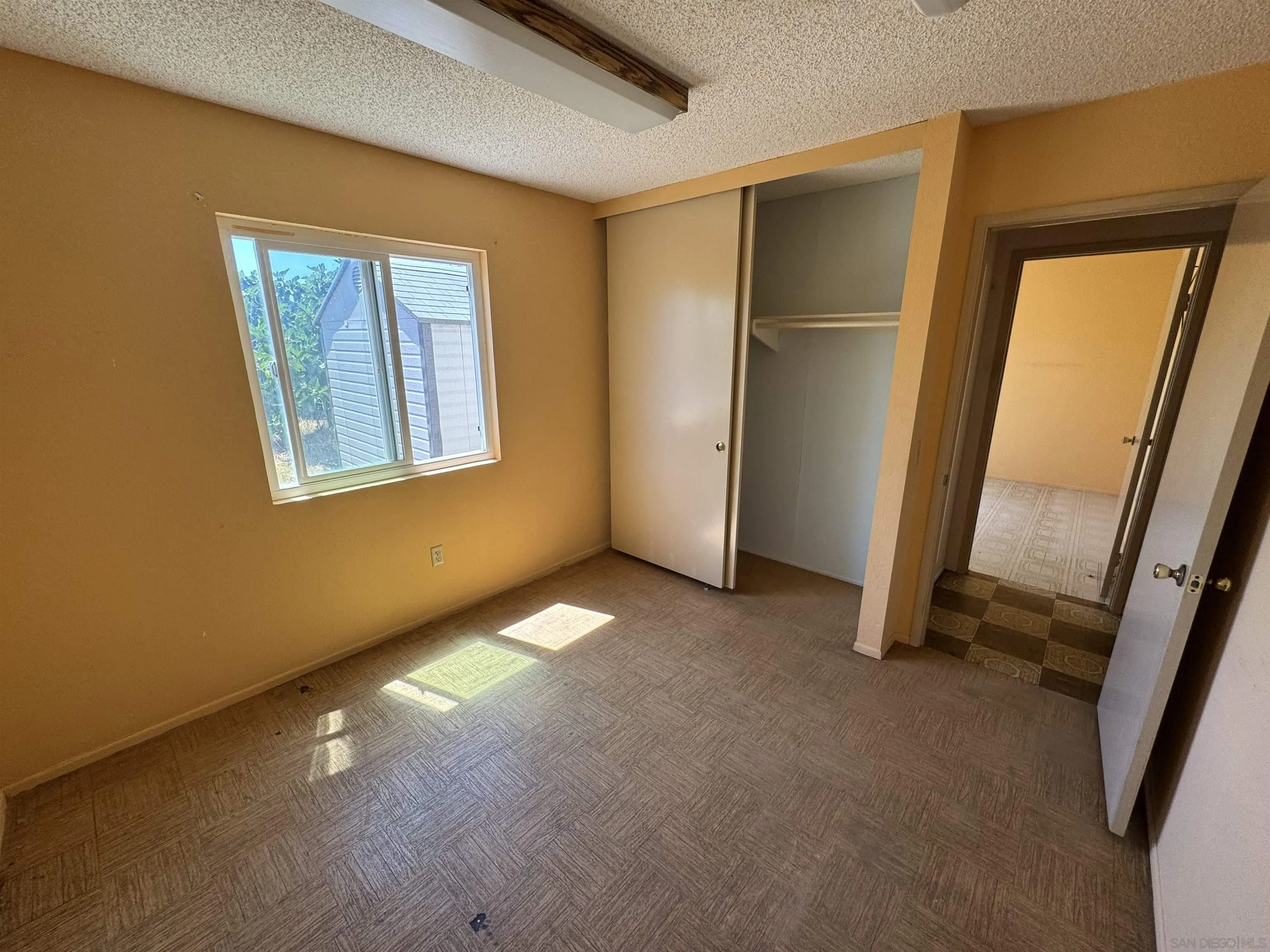 10490 Stanfield Circle San Diego, CA 92126 - Photo 11 of 21 a view of empty room with front door