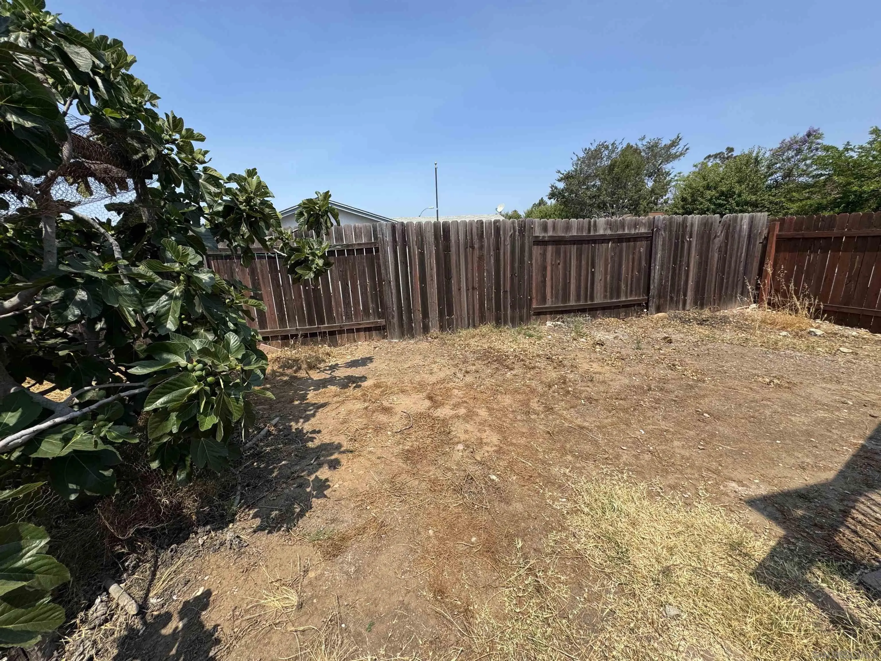 10490 Stanfield Circle San Diego, CA 92126 - Photo 19 of 21 a view of garden with wooden fence