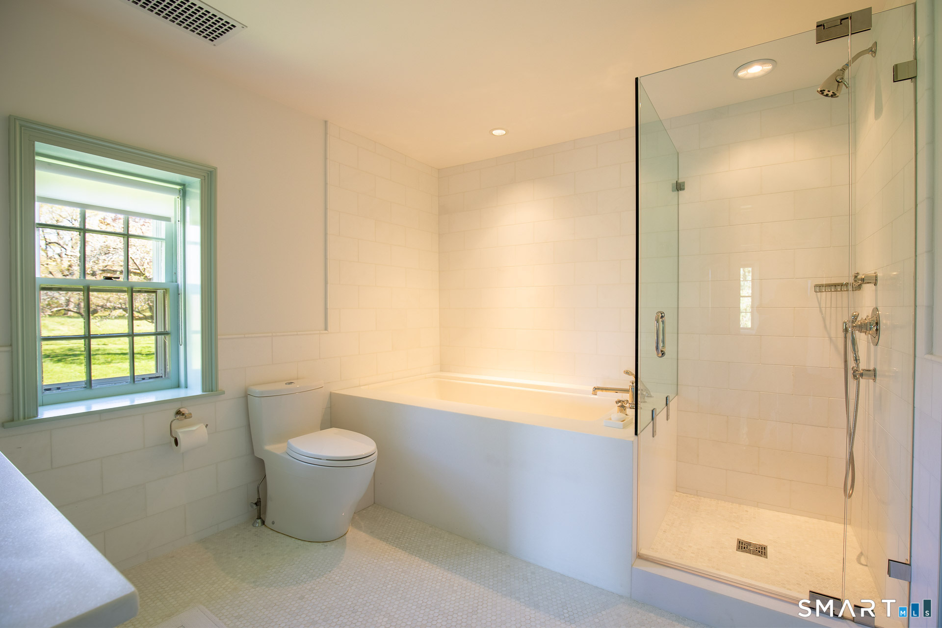102 Melius Road Warren, CT 06754 - Photo 14 of 35 a bathroom with a bathtub and shower