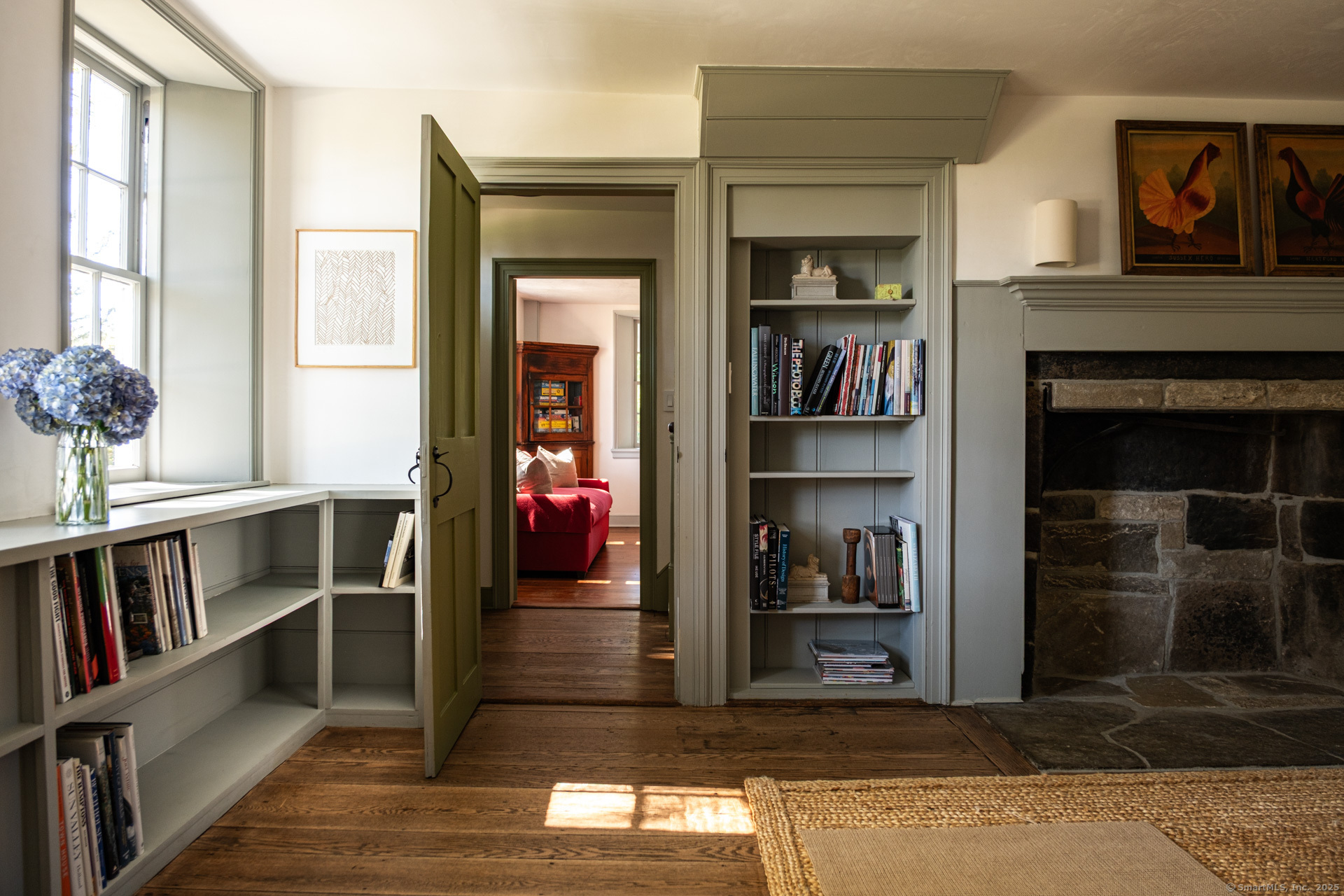 102 Melius Road Warren, CT 06754 - Photo 20 of 39 a living room with furniture and a fireplace