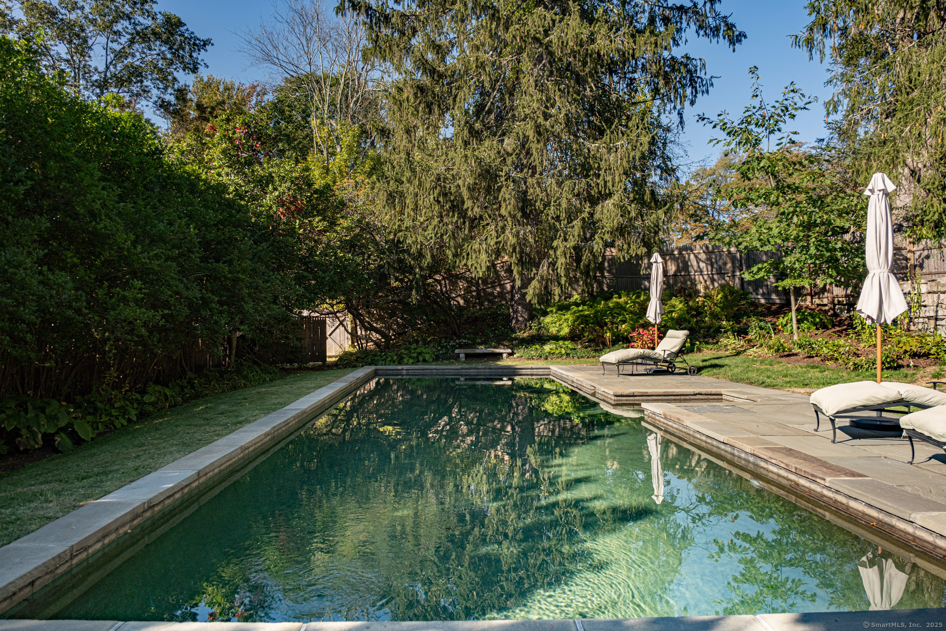 102 Melius Road Warren, CT 06754 - Photo 27 of 39 a view of yard with swimming pool and trees