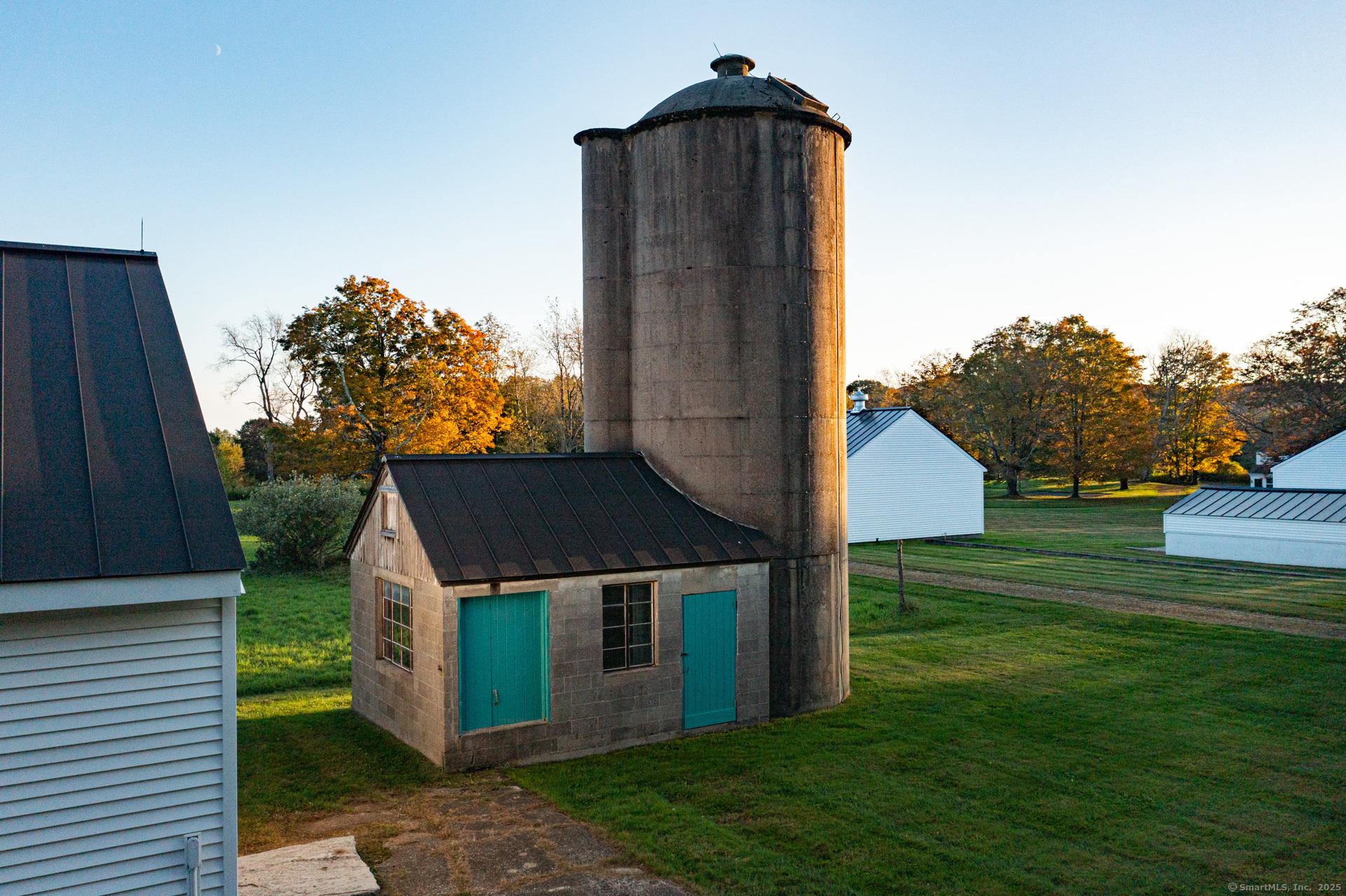 102 Melius Road Warren, CT 06754 - Photo 28 of 39 a front view of a house with a garden
