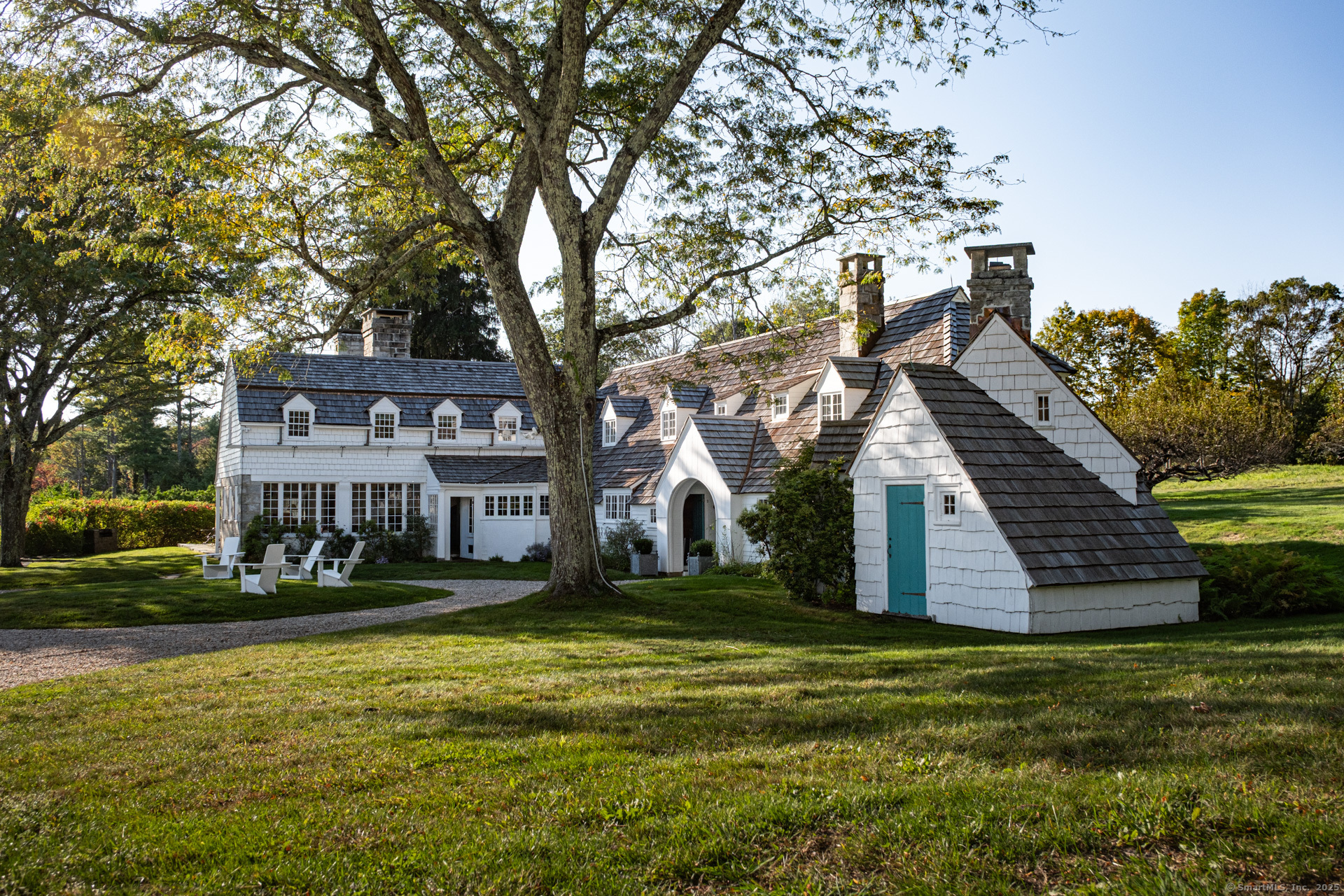 102 Melius Road Warren, CT 06754 - Photo 39 of 39 a view of a house with a yard
