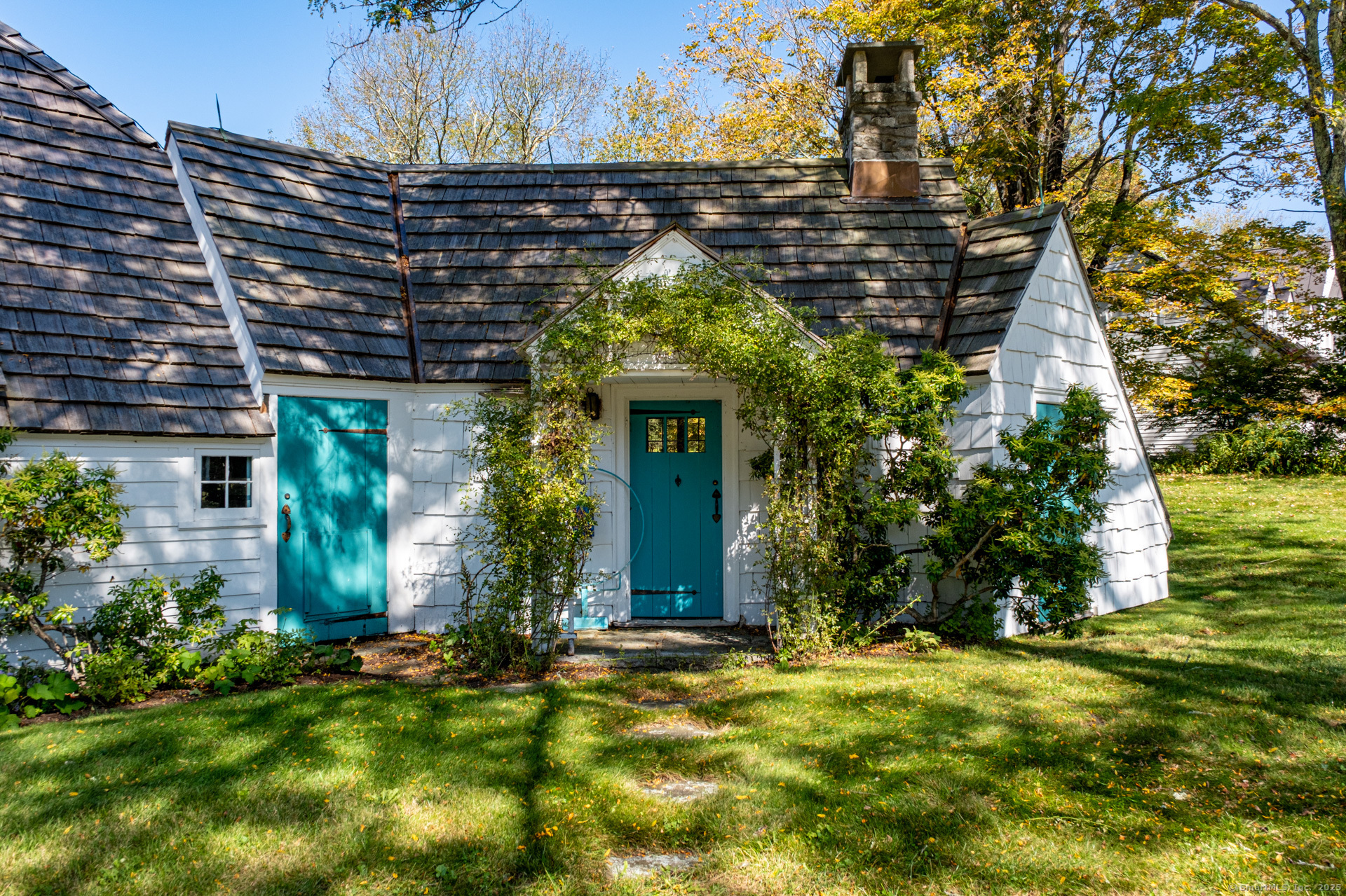 102 Melius Road Warren, CT 06754 - Photo 4 of 39 a front view of a house with a yard