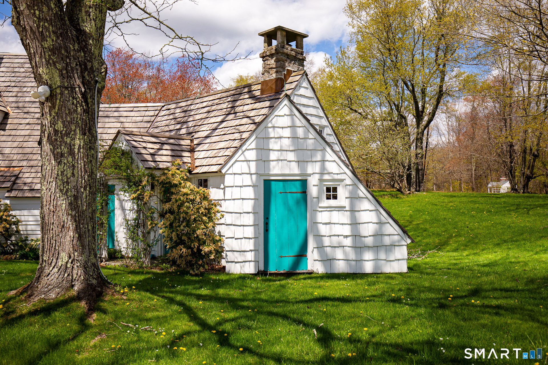 102 Melius Road Warren, CT 06754 - Photo 5 of 35 a front view of a house with a yard