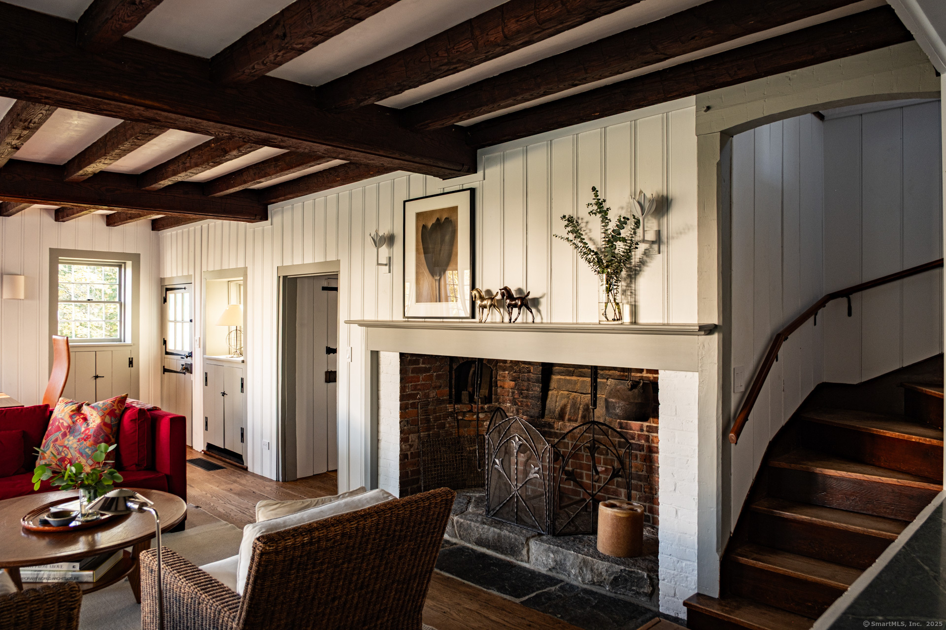 102 Melius Road Warren, CT 06754 - Photo 8 of 39 a living room with furniture and wooden floor