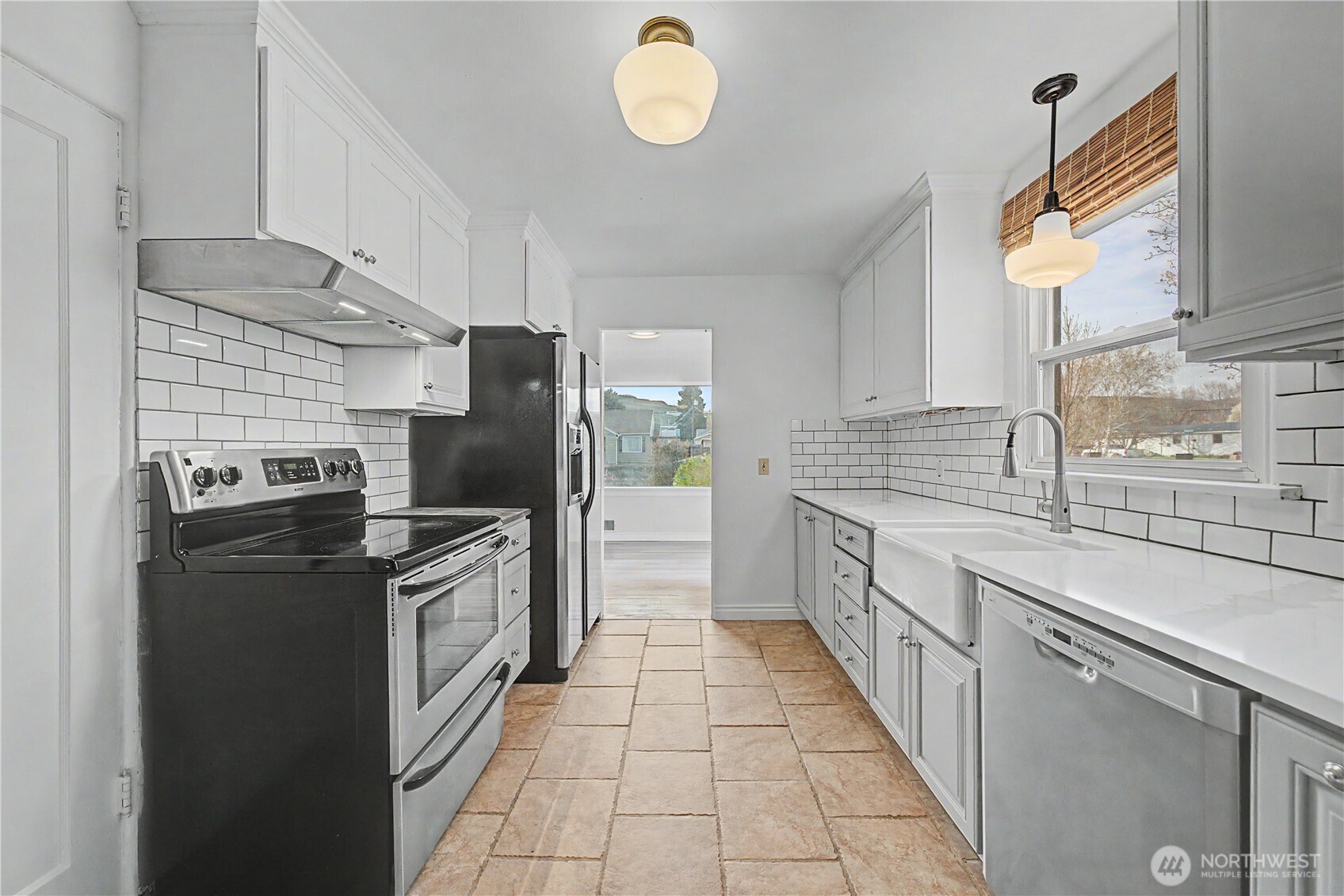 222 D Street Southwest Ephrata, WA 98823 - Photo 18 of 40 a large kitchen with cabinets and stainless steel appliances