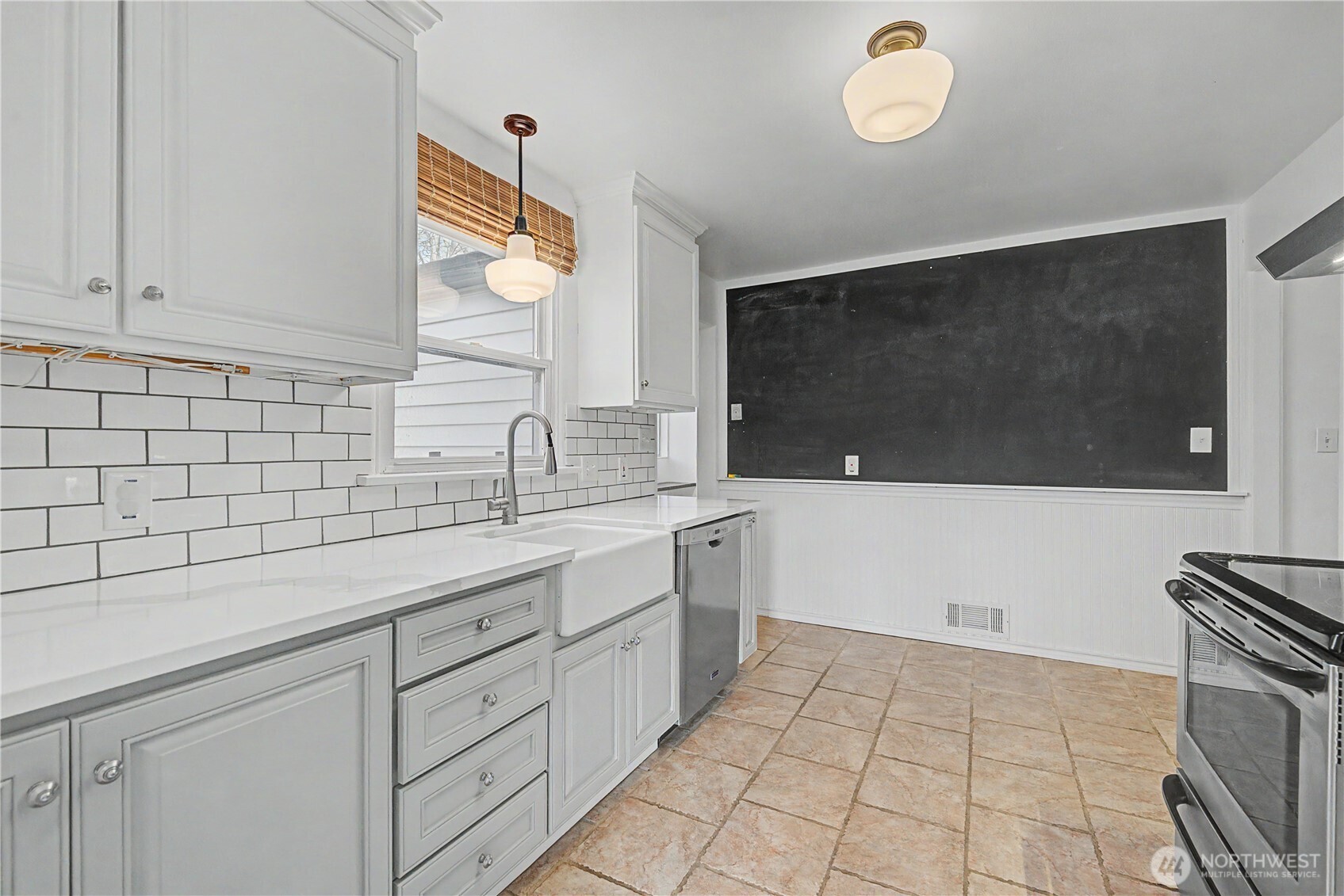 222 D Street Southwest Ephrata, WA 98823 - Photo 19 of 40 a kitchen with a sink and cabinets