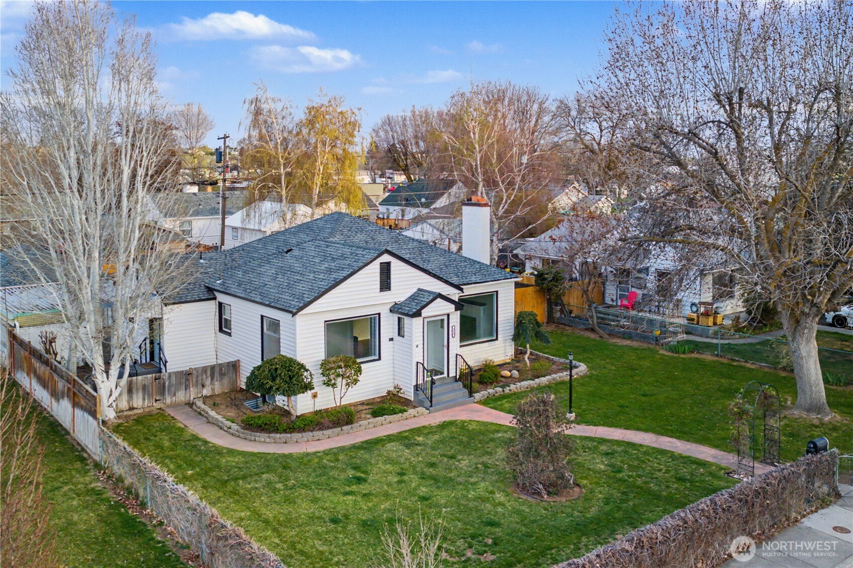 222 D Street Southwest Ephrata, WA 98823 - Photo 2 of 40 a front view of a house with garden