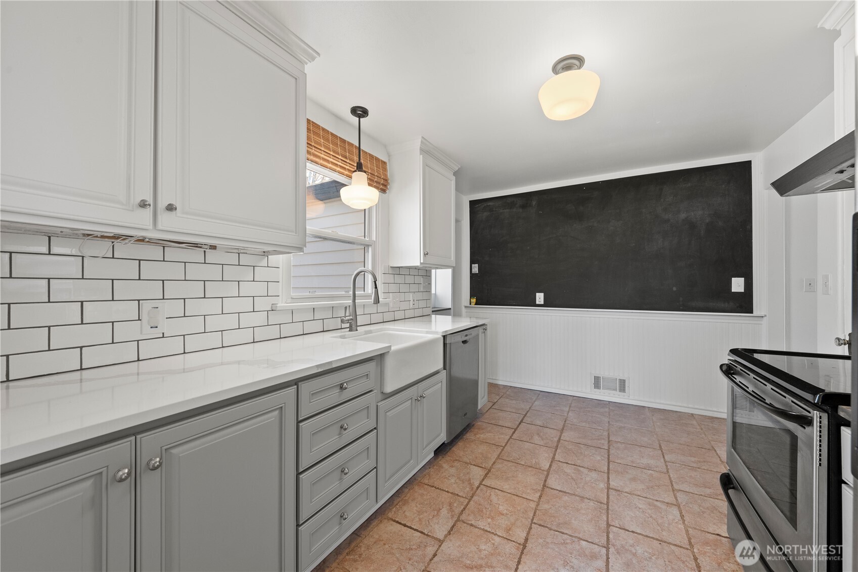 222 D Street Southwest Ephrata, WA 98823 - Photo 21 of 40 a kitchen with a sink and a stove top oven