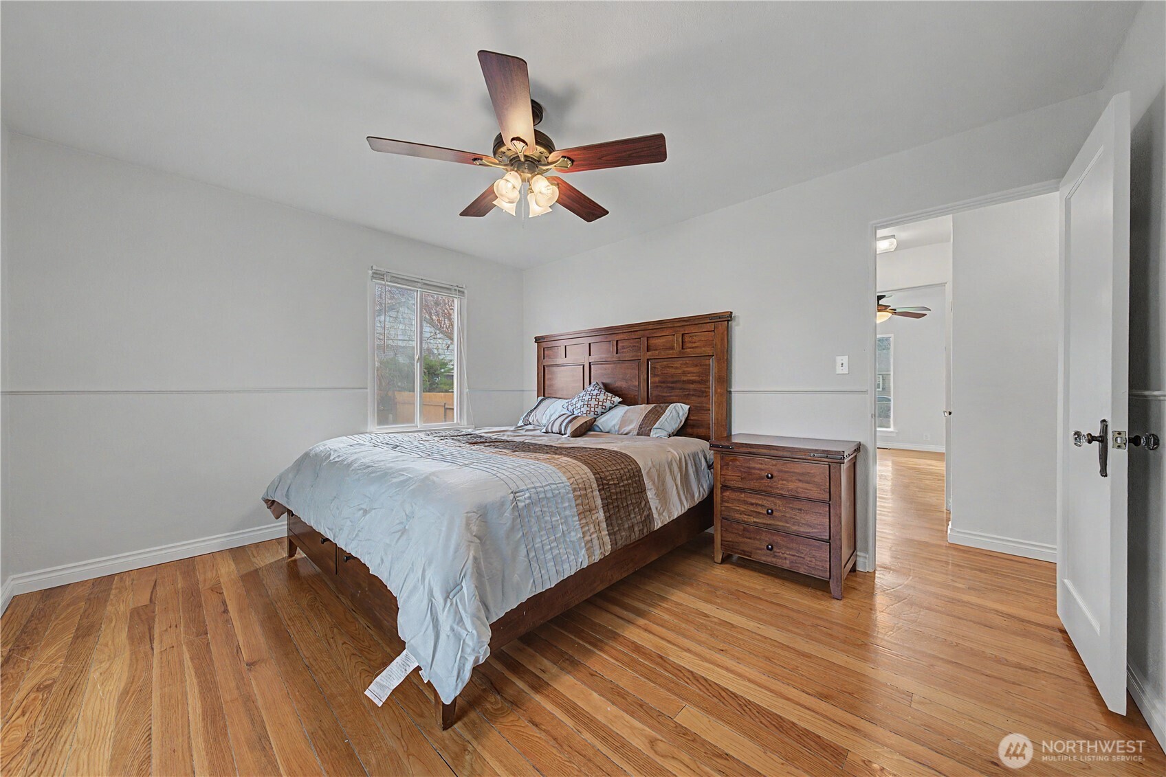 222 D Street Southwest Ephrata, WA 98823 - Photo 24 of 40 a bedroom with a bed and wooden floor