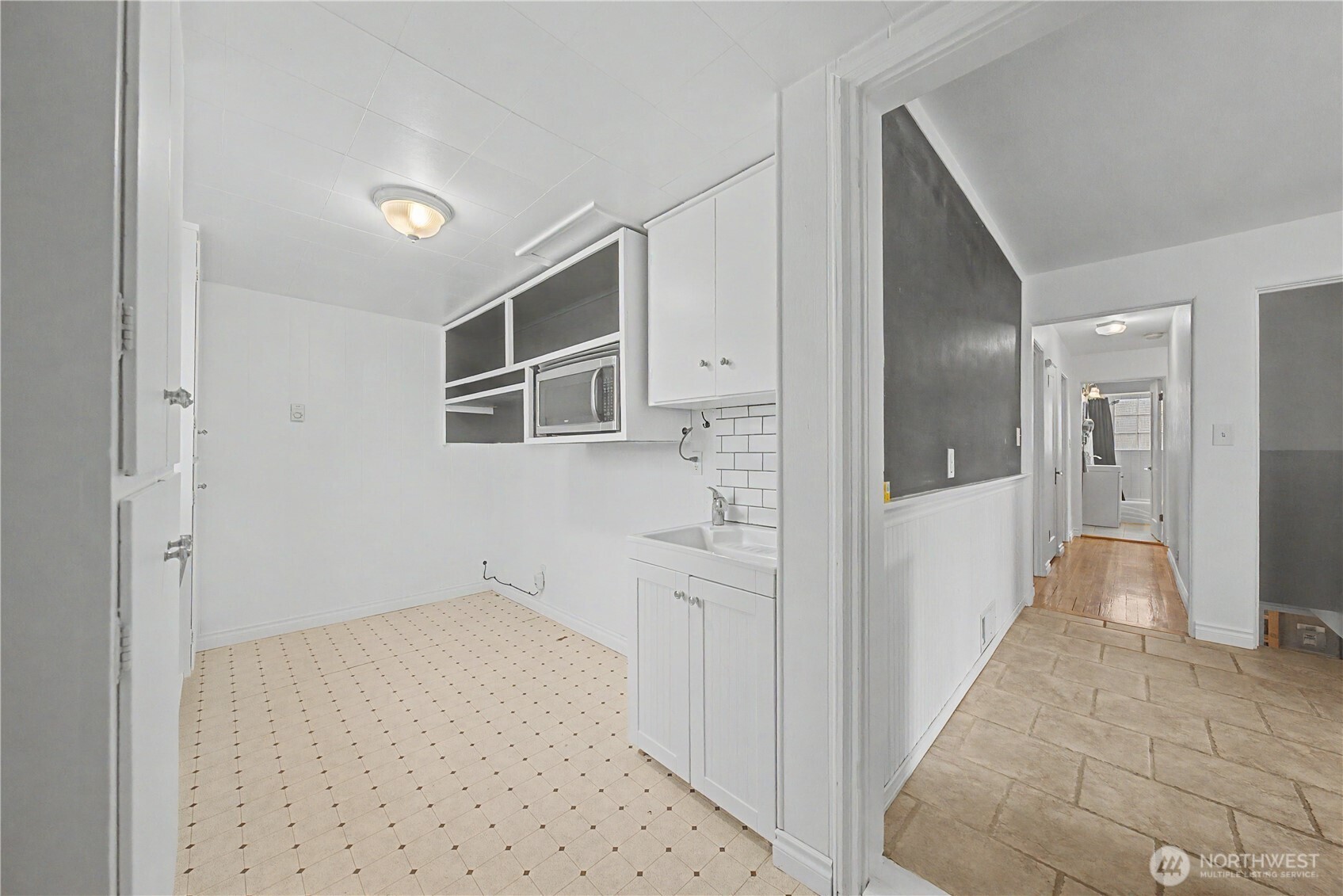 222 D Street Southwest Ephrata, WA 98823 - Photo 28 of 40 a view of a hallway with wooden floor and staircase
