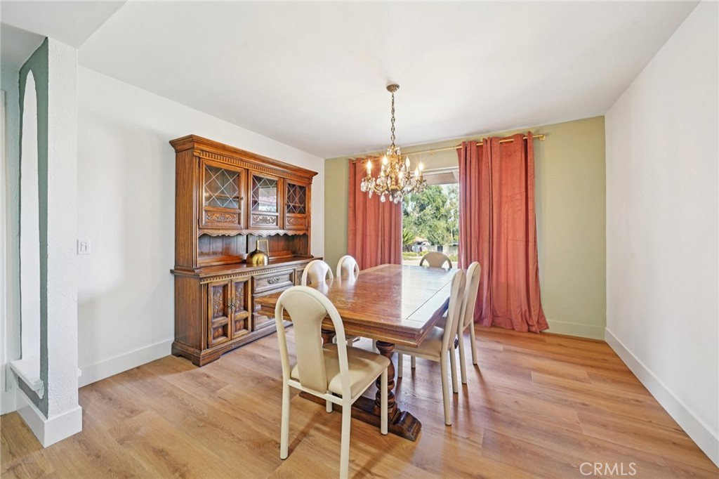 1500 Country Club Drive Riverside, CA 92506 - Photo 11 of 39 a view of a dining room with furniture window and outside view