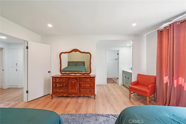 a bathroom with a double vanity sink and mirror