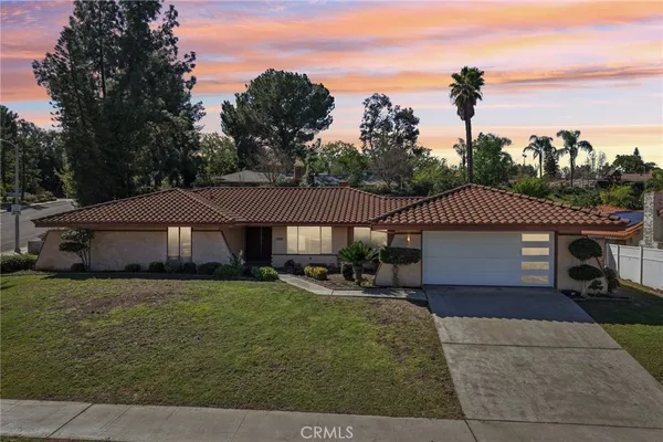 a house view with a garden space