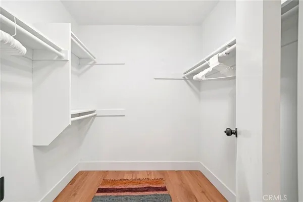 a bathroom with a sink a mirror and shower