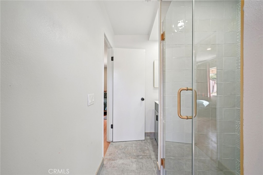 1500 Country Club Drive Riverside, CA 92506 - Photo 24 of 39 a bathroom with a glass shower door