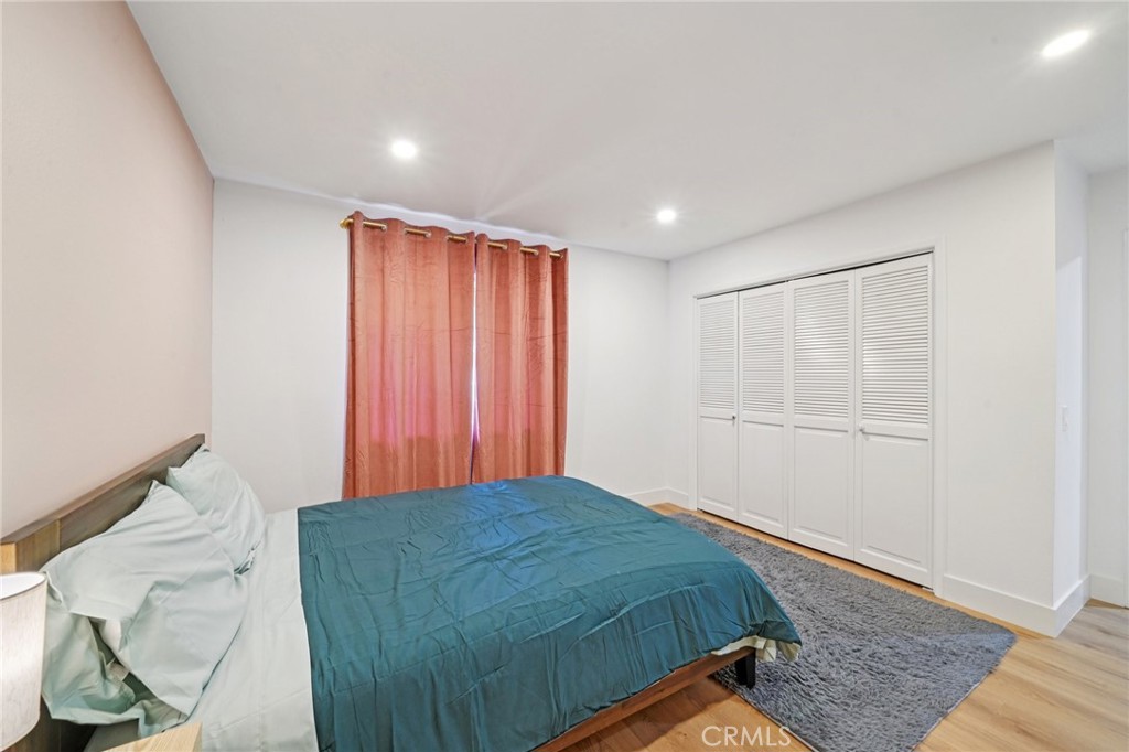 1500 Country Club Drive Riverside, CA 92506 - Photo 30 of 39 a bedroom with a bed and a window