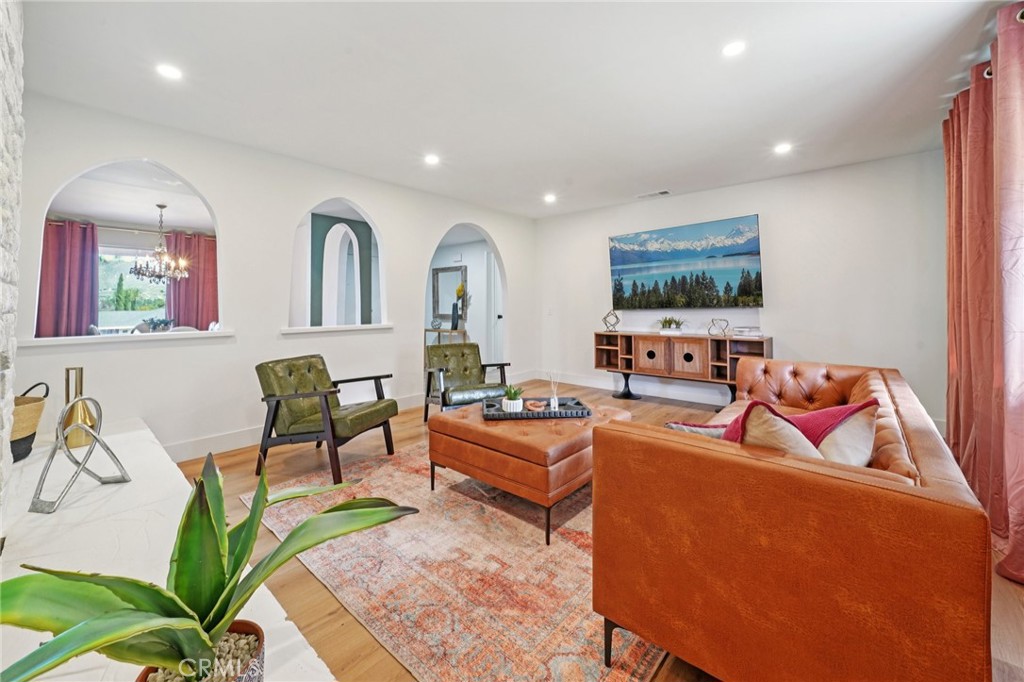 1500 Country Club Drive Riverside, CA 92506 - Photo 5 of 39 a living room with furniture and a flat screen tv