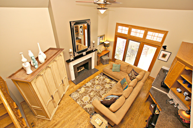 11 Tartan Ridge Road Burr Ridge, IL 60527 - Photo 12 of 25 a living room with a bed furniture and a flat screen tv